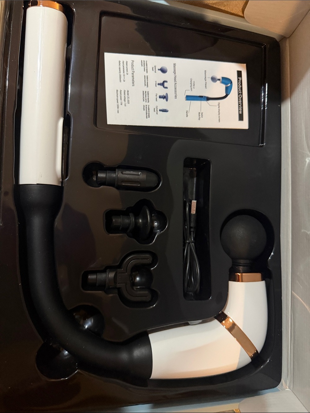 White and Black Fascial Massage Gun with Rose Gold Accents